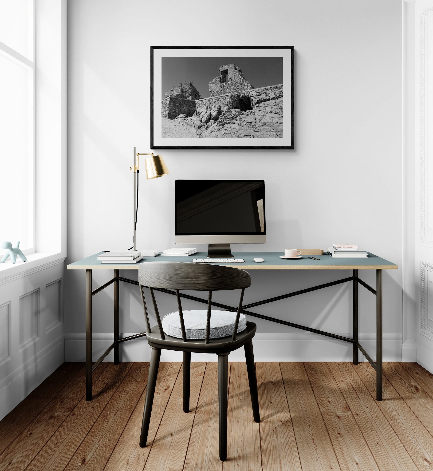 Modern home office with a desk, chair, computer monitor, and framed artwork on a white wall. B/W Ruins on Olive Farm - Portugal, Original Photograph by Kim A. Bailey