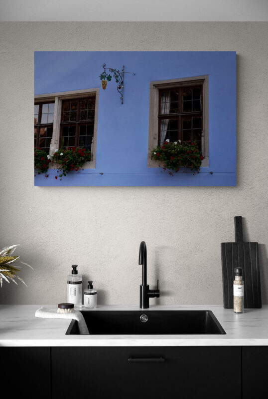 Blue-Wall-with-Windows-and-Gold-Grapes Original Photograph by Kim A. Bailey Hanging in a Kitchen
