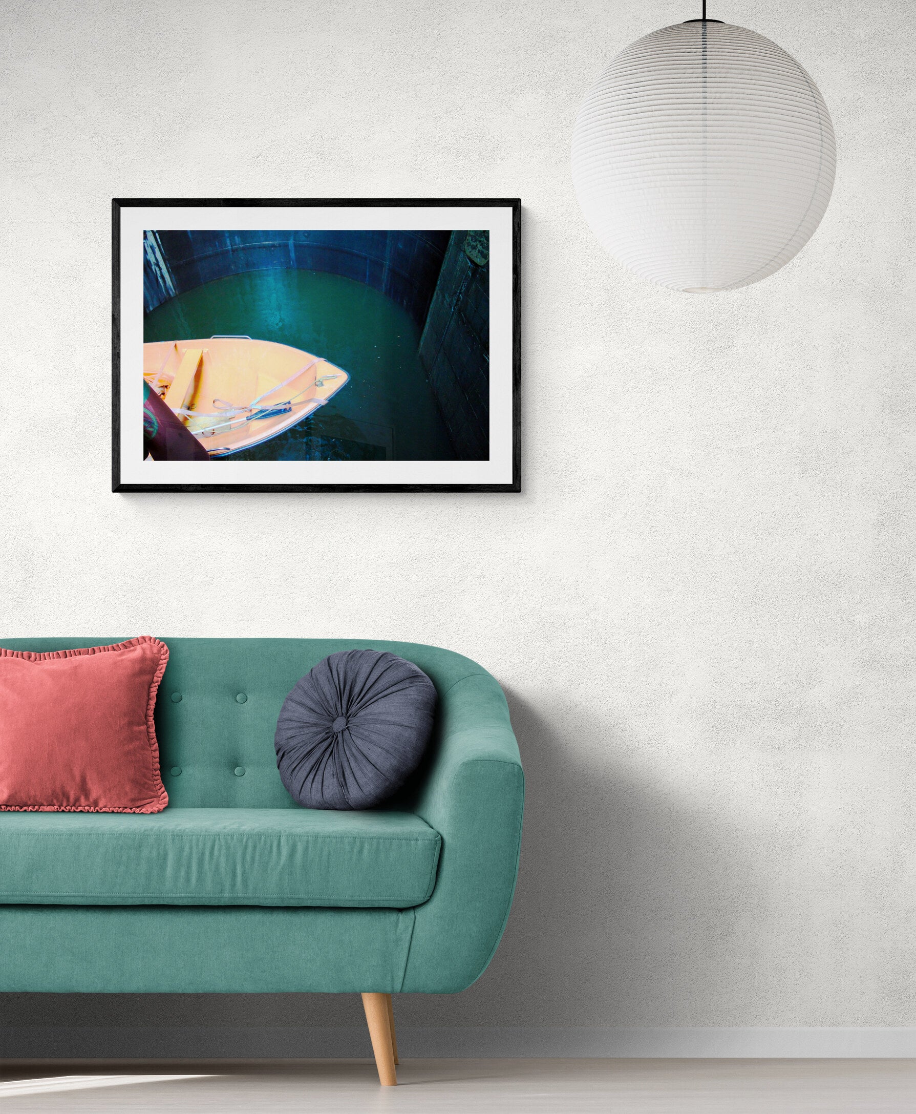 Framed photograph on a wall above a teal sofa with pink and purple cushions. Boat in a Lock - Portugal, Original Photograph by Kim A. Bailey