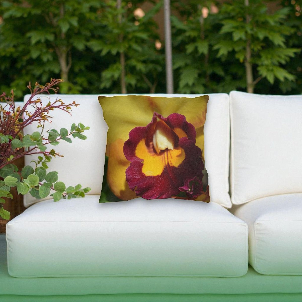Cattleya_Orchid_Pillow_on_White_Couch_by_Kim_A_Bailey