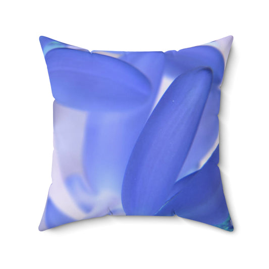 Blue and white abstract pillow on a white background