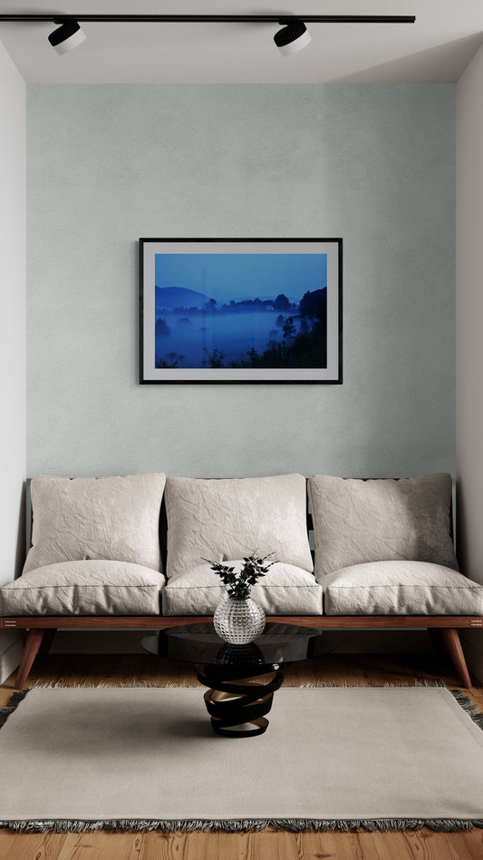 Living room with a sofa, vase, and wall art depicting a misty landscape. Fog Over Seneca, Original Photograph by Kim A. Bailey