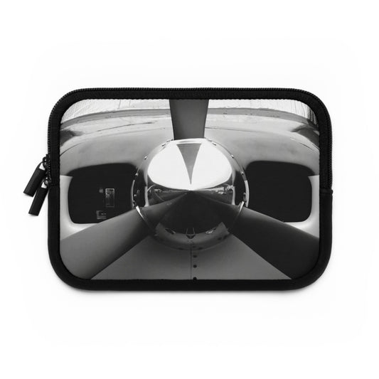 A neoprene laptop or tablet sleeve featuring a black and white photograph of a propeller on the front.
