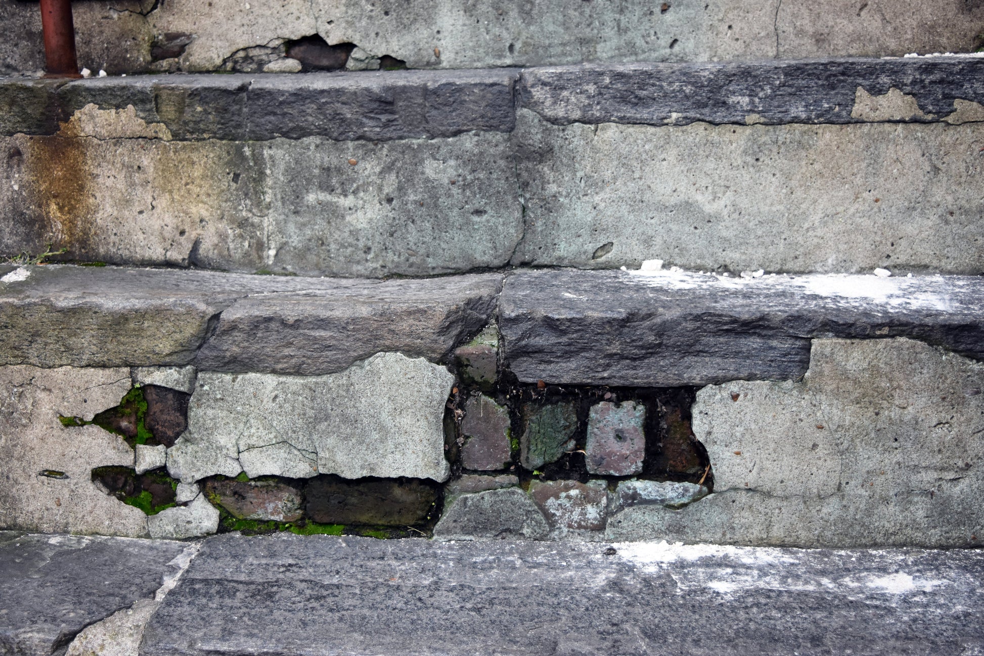 A color photograph depicting layers of rock and cement on stairs at a river front, with textures and small glitter-like effects on the surface. Layers of Rock and Cement on the Stairs at the River Front, Savannah, Georgia, Original Photogrpah by Kim A. bailey
