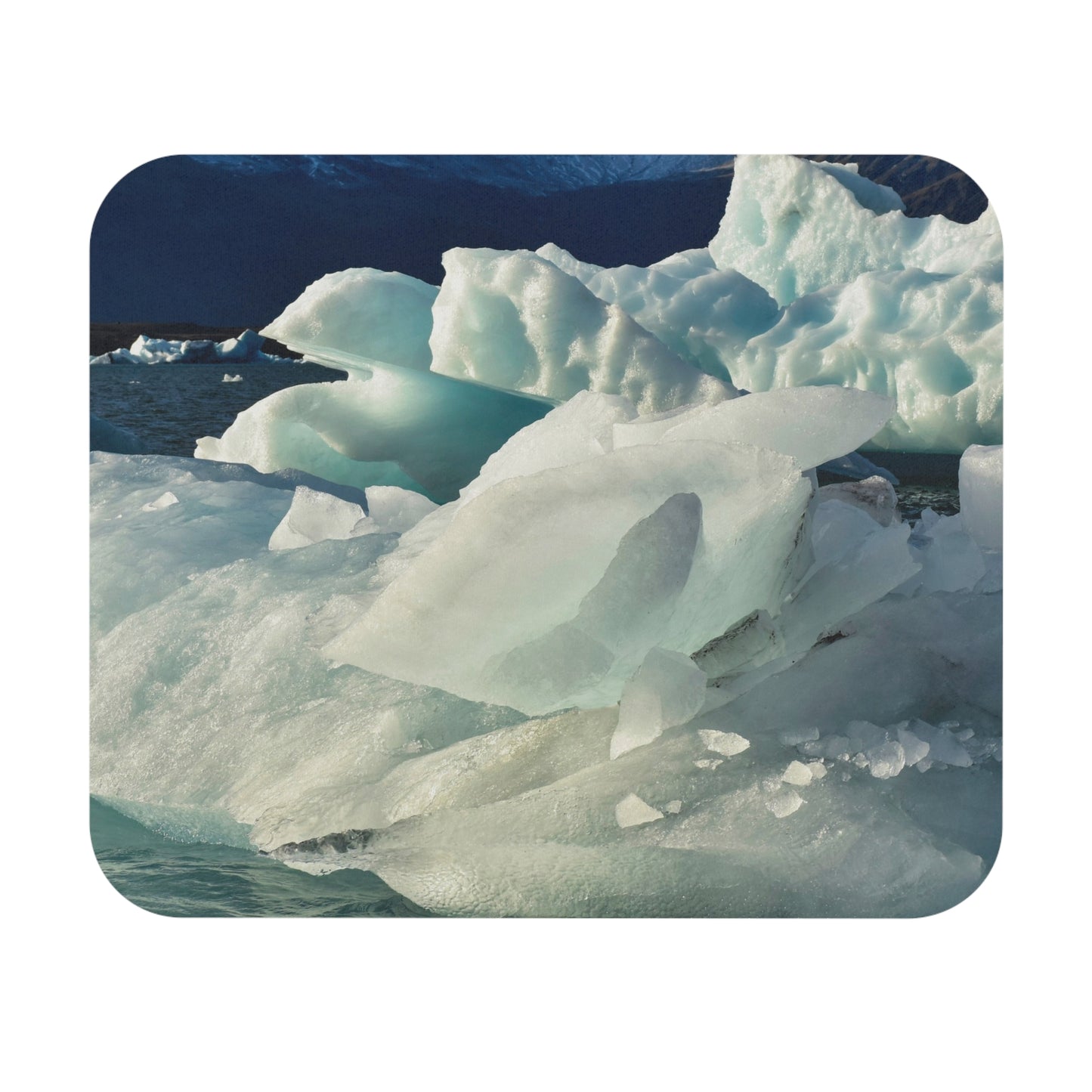 A mouse pad with an image of glacial ice in blue tones, representing a natural cold environment.