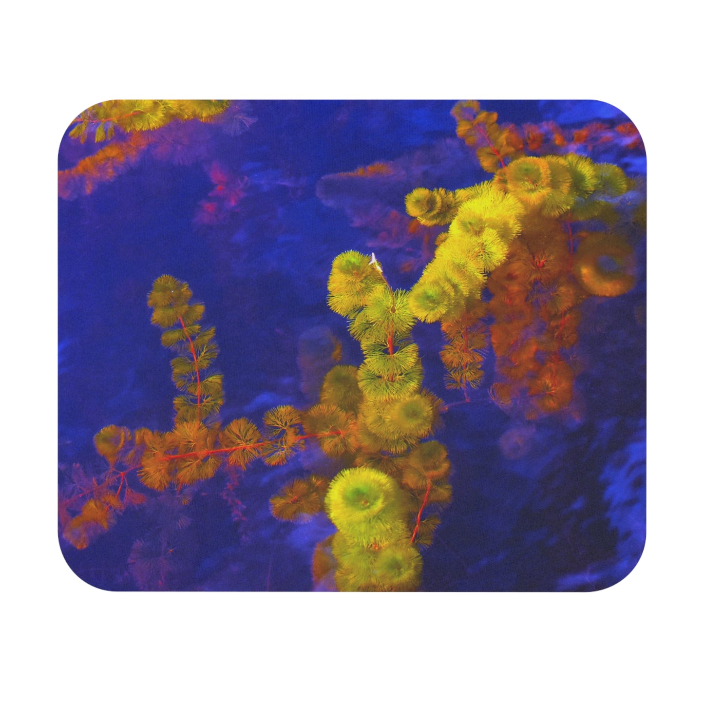 A rectangular mouse pad with an abstract purple and yellow design on a dark background.