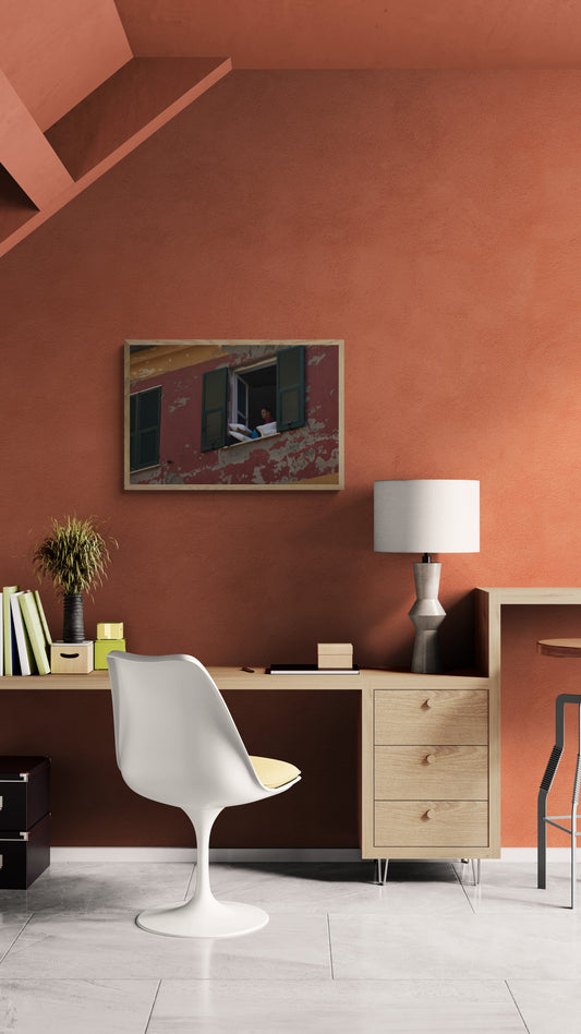 Modern office interior with a desk, chair, lamp, and artwork on an orange wall. Open Window, Original Photograph by Kim A. Bailey