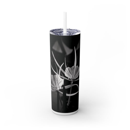 Tumbler with black and white floral design on a white background