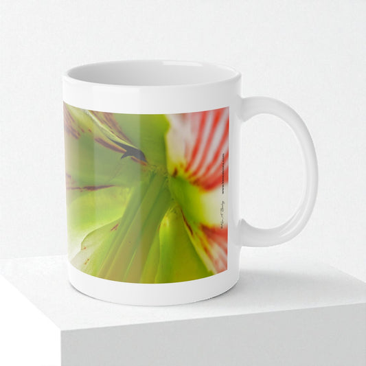 White mug with a colorful flower design on a white background