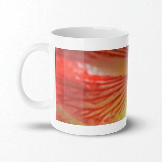 White mug with a colorful abstract design on a white background