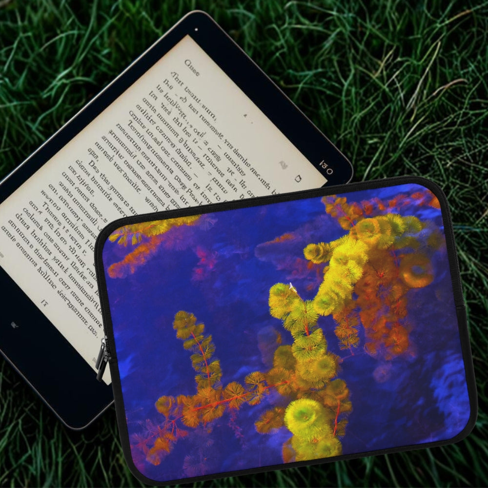Tablet with colorful case on grass
