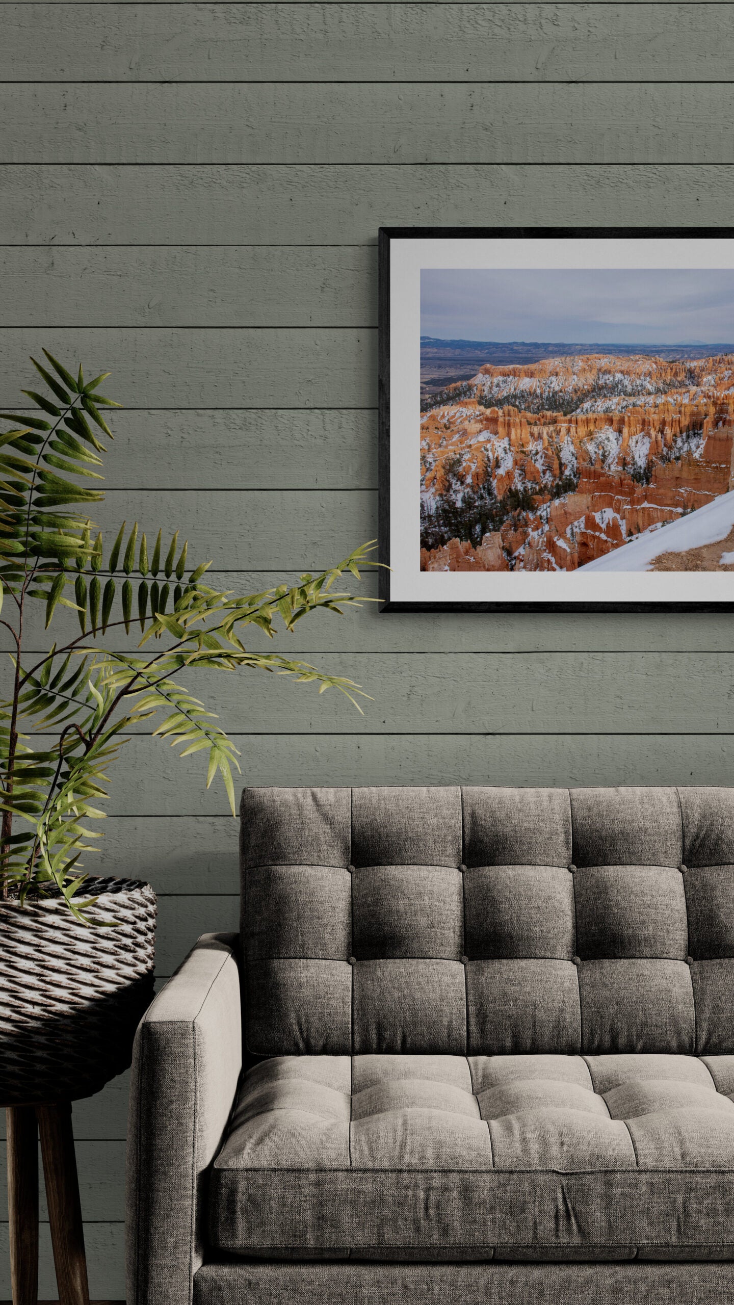 Bryce-Canyon Original photograph by Kim A. Bailey hanging over a tufted sofa