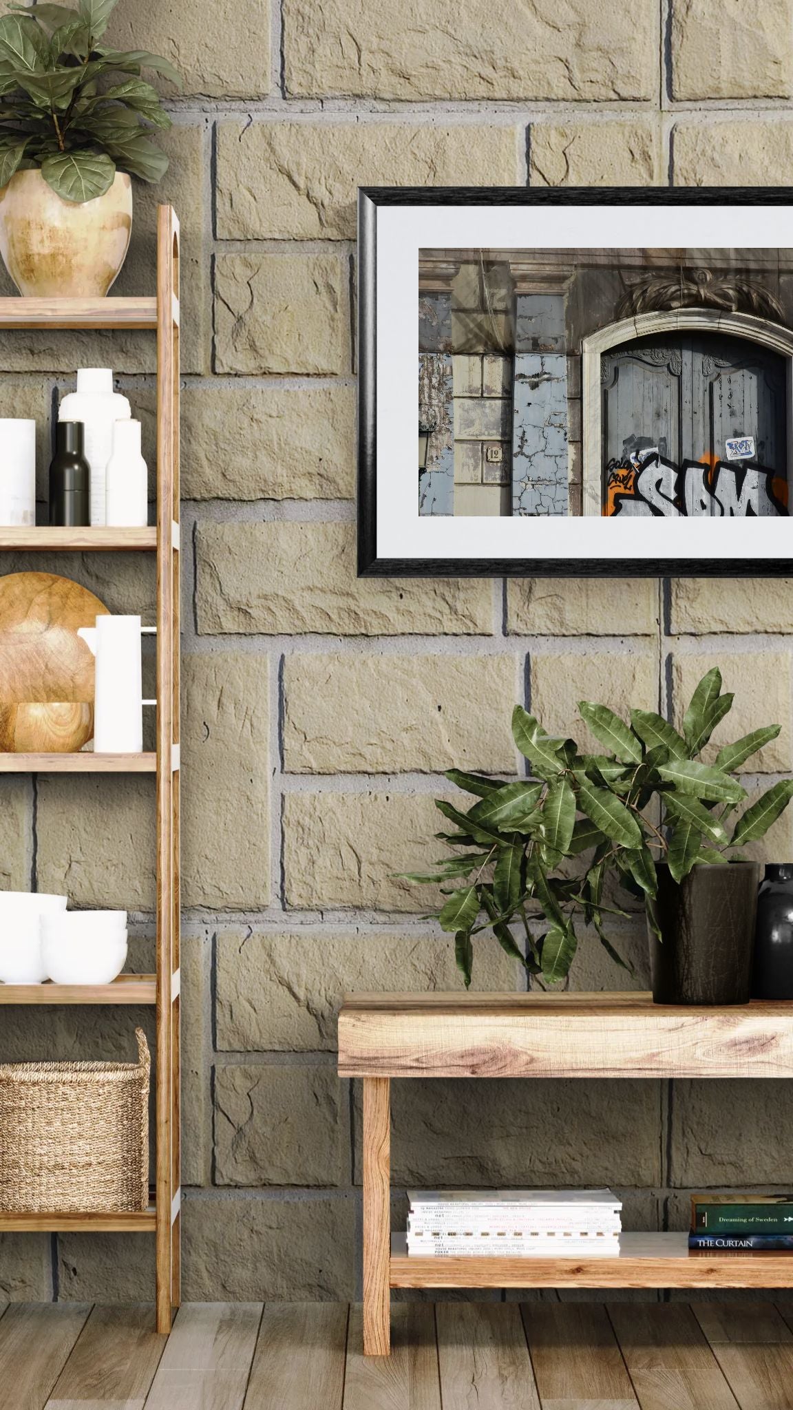 Room interior with stone wall, wooden shelf, and decorative items.