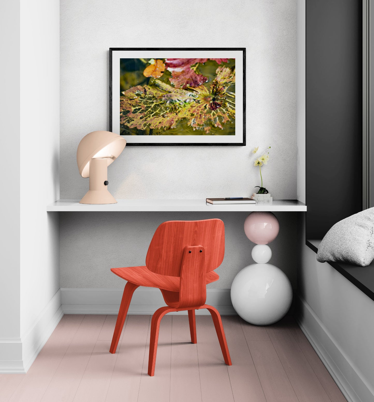 Red chair in a room with a painting and decor items. Decaying Leaves in Water (Orange, Red, and Green), Original Photograph by Kim A. Bailey