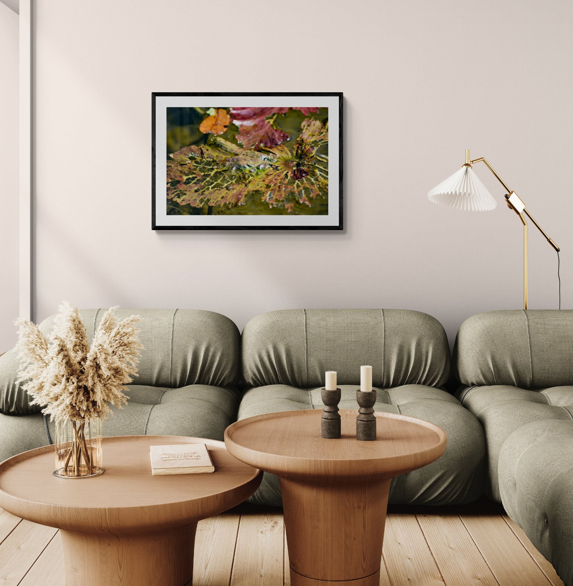 Living room with a sofa, coffee table, and wall art Decaying Leaves in Water (Orange, Red, and Green), Original Photograph by Kim A. Bailey