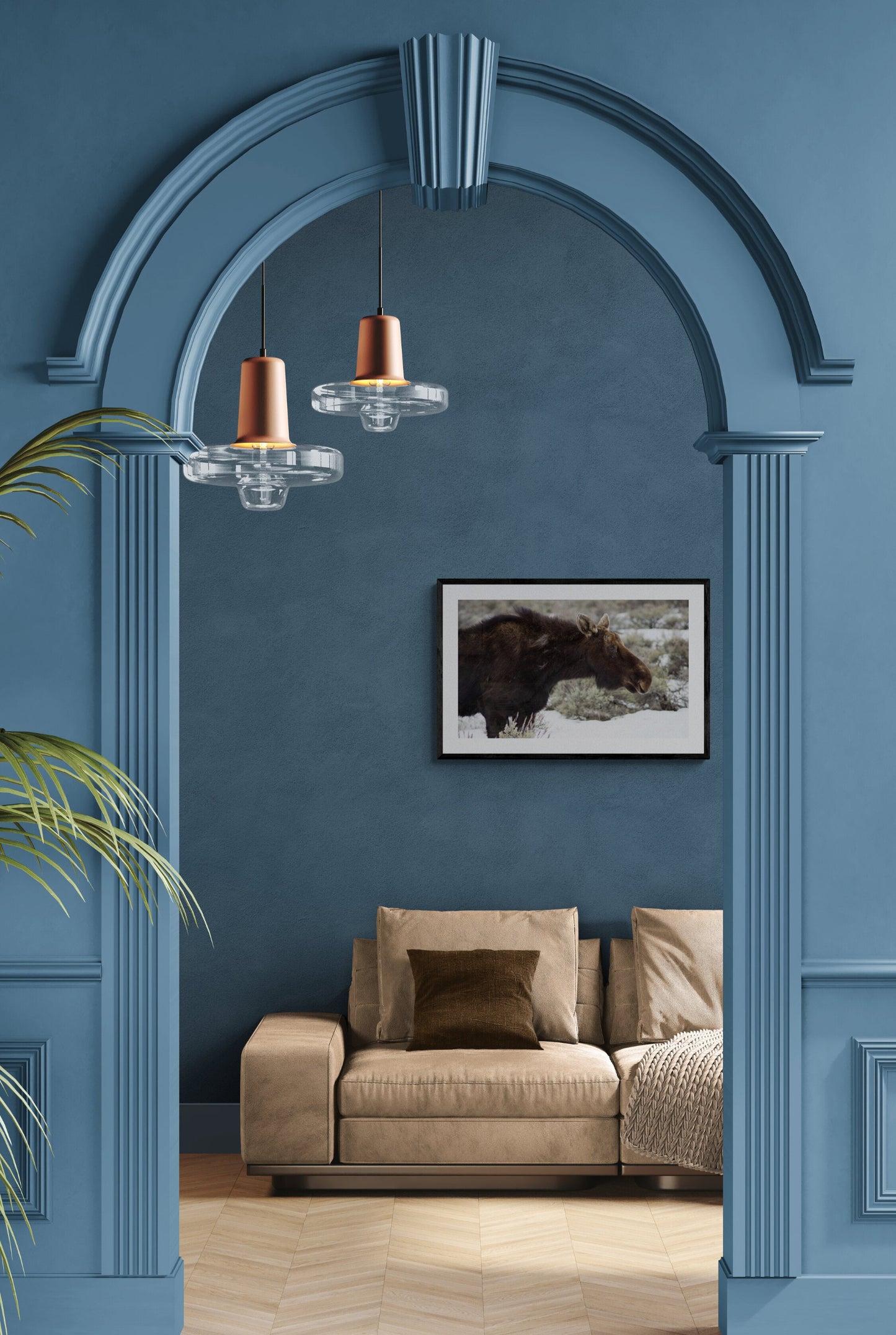 Beige sofa in a room with blue walls and decorative archway. Female Moose in Jackson Hole, Wyoming Original Photograph by Kim A. Bailey