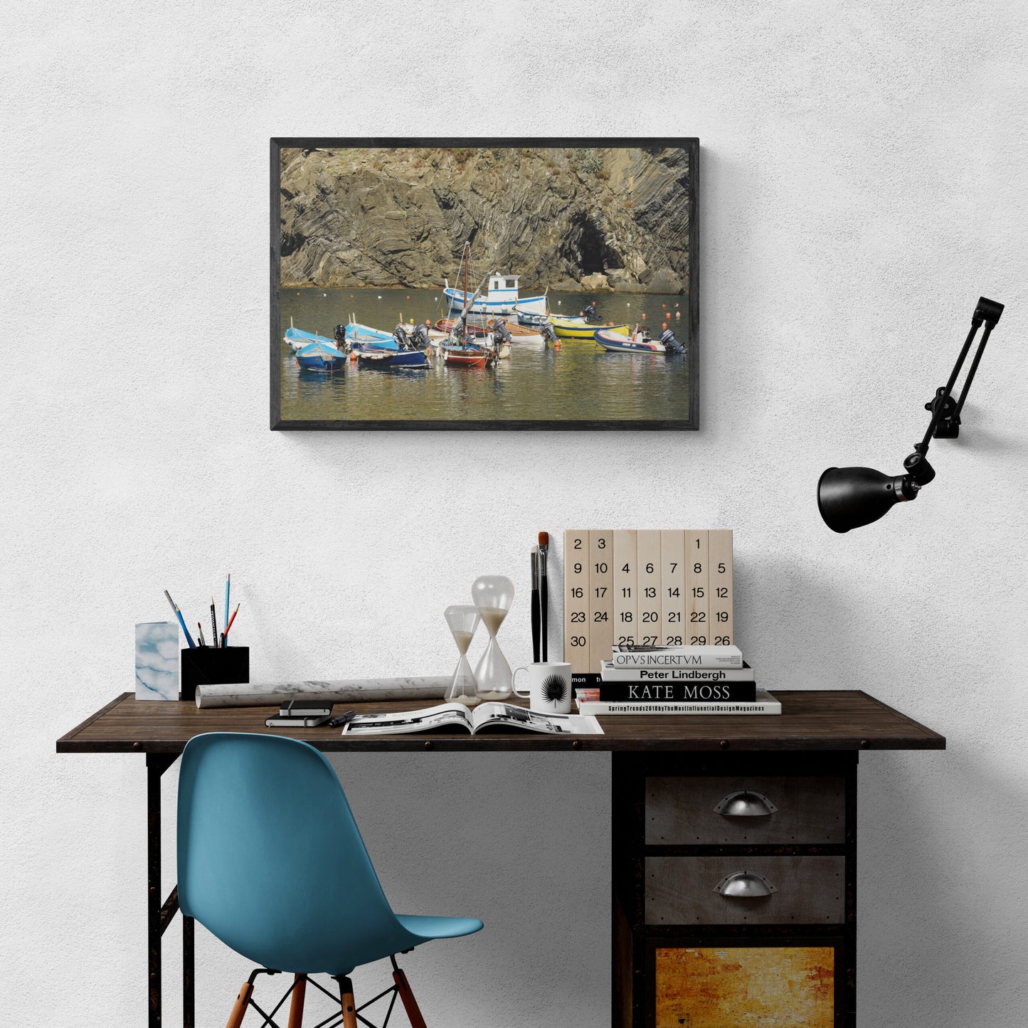 Fishing_Boats_in_the_Bay_Original_Photograph_by_Kim_A._Bailey over a wood desk