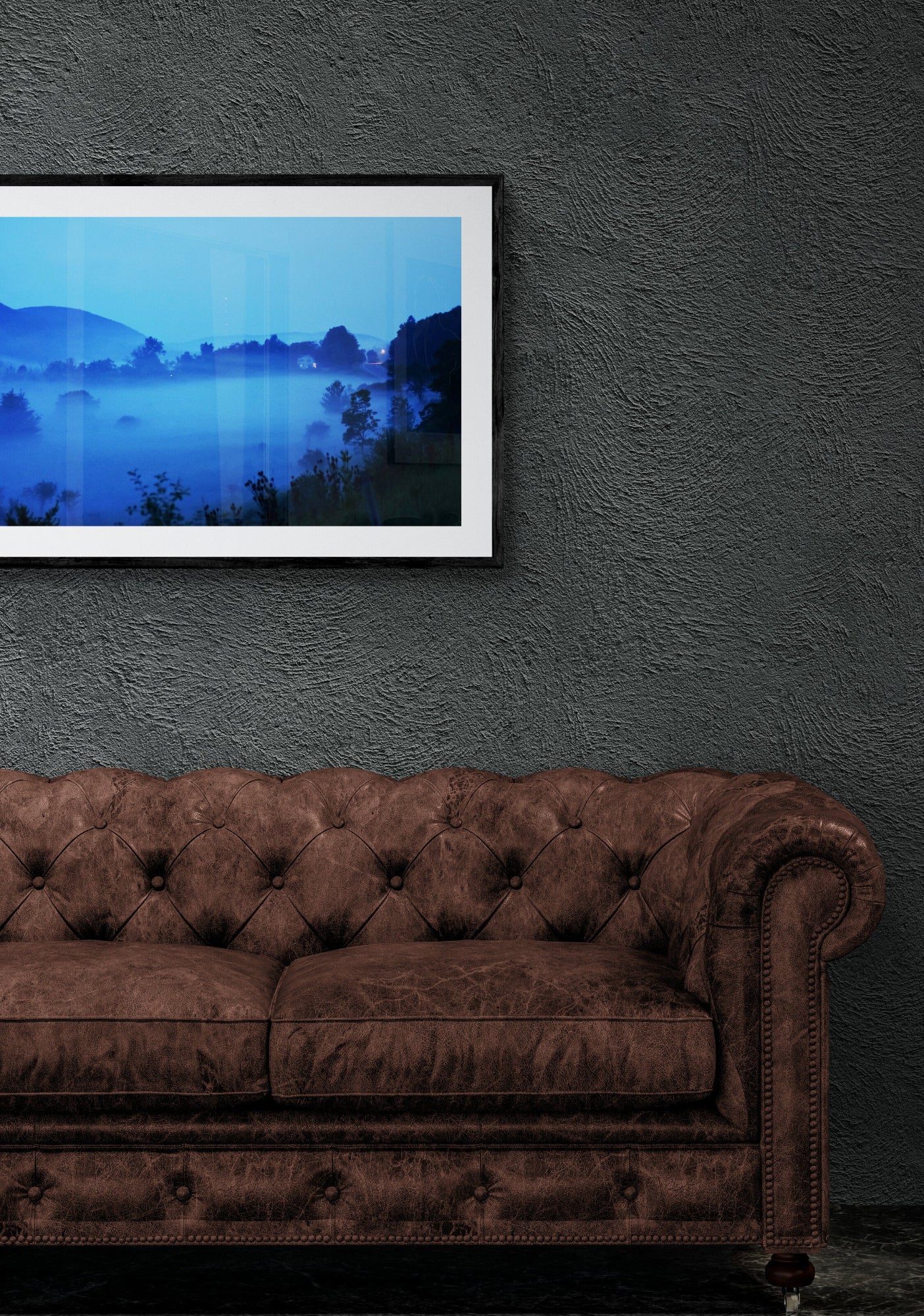 Brown chesterfield sofa in front of a framed landscape picture on a dark wall. Fog Over Seneca, Original Photograph by Kim A. Bailey