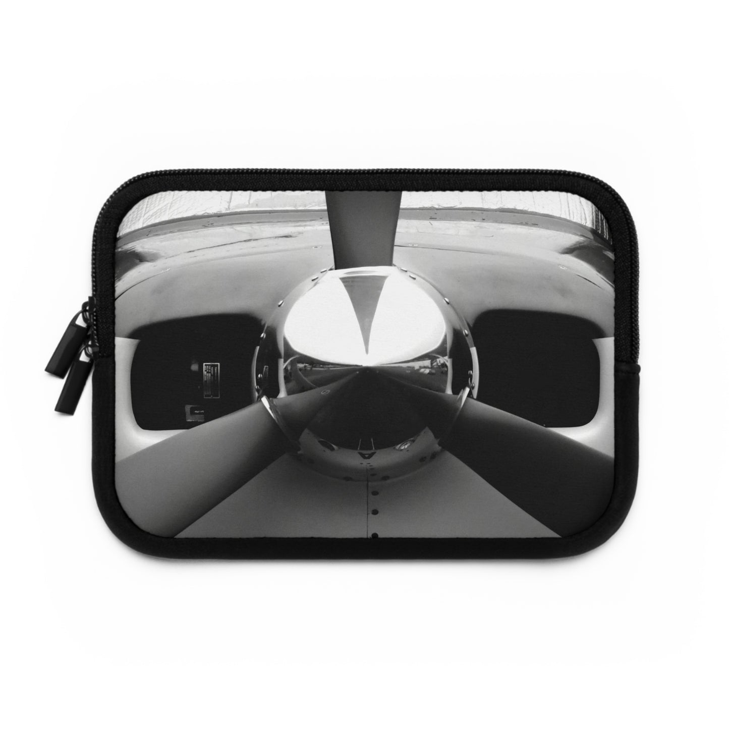 A neoprene laptop or tablet sleeve featuring a black and white photograph of a propeller on the front.