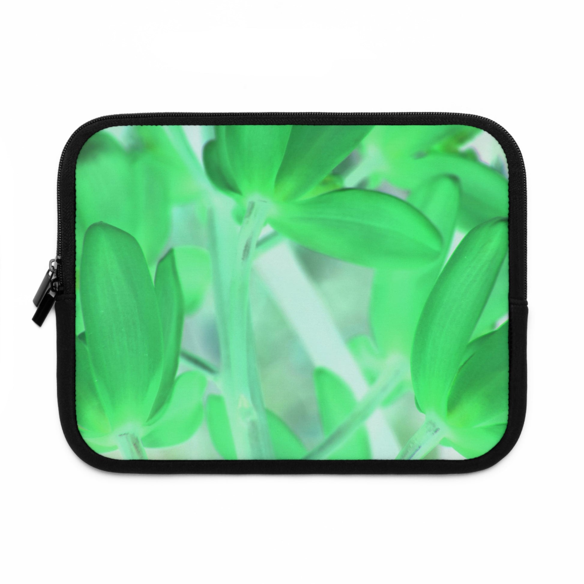 A neoprene laptop or tablet sleeve featuring a green floral 'Green Tinted Orchids' photograph on the front.