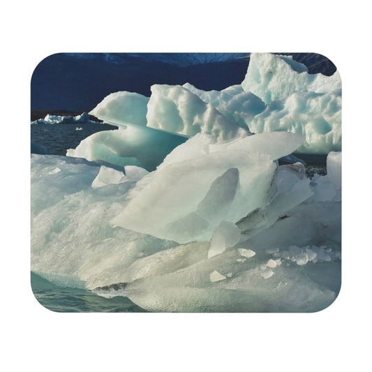 A mouse pad with an image of glacial ice in blue tones, representing a natural cold environment.