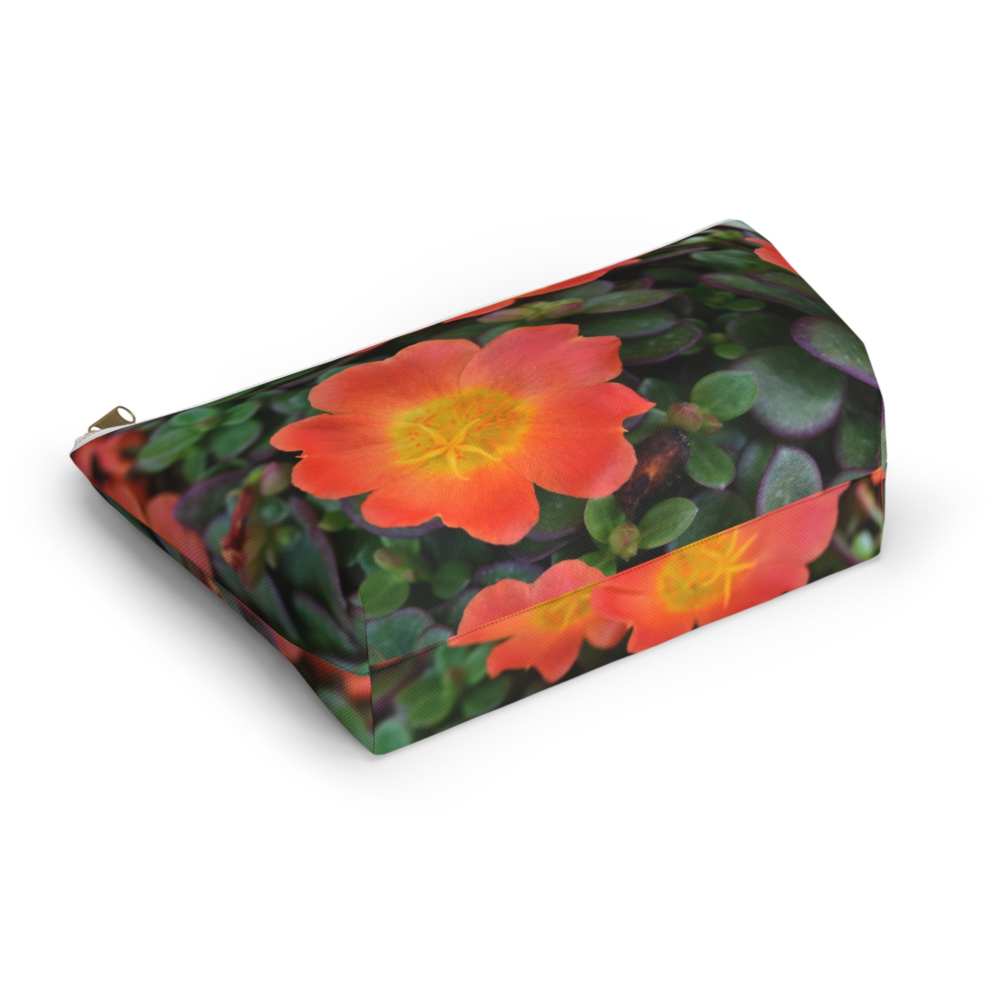 Pouch with orange flowers on a green background