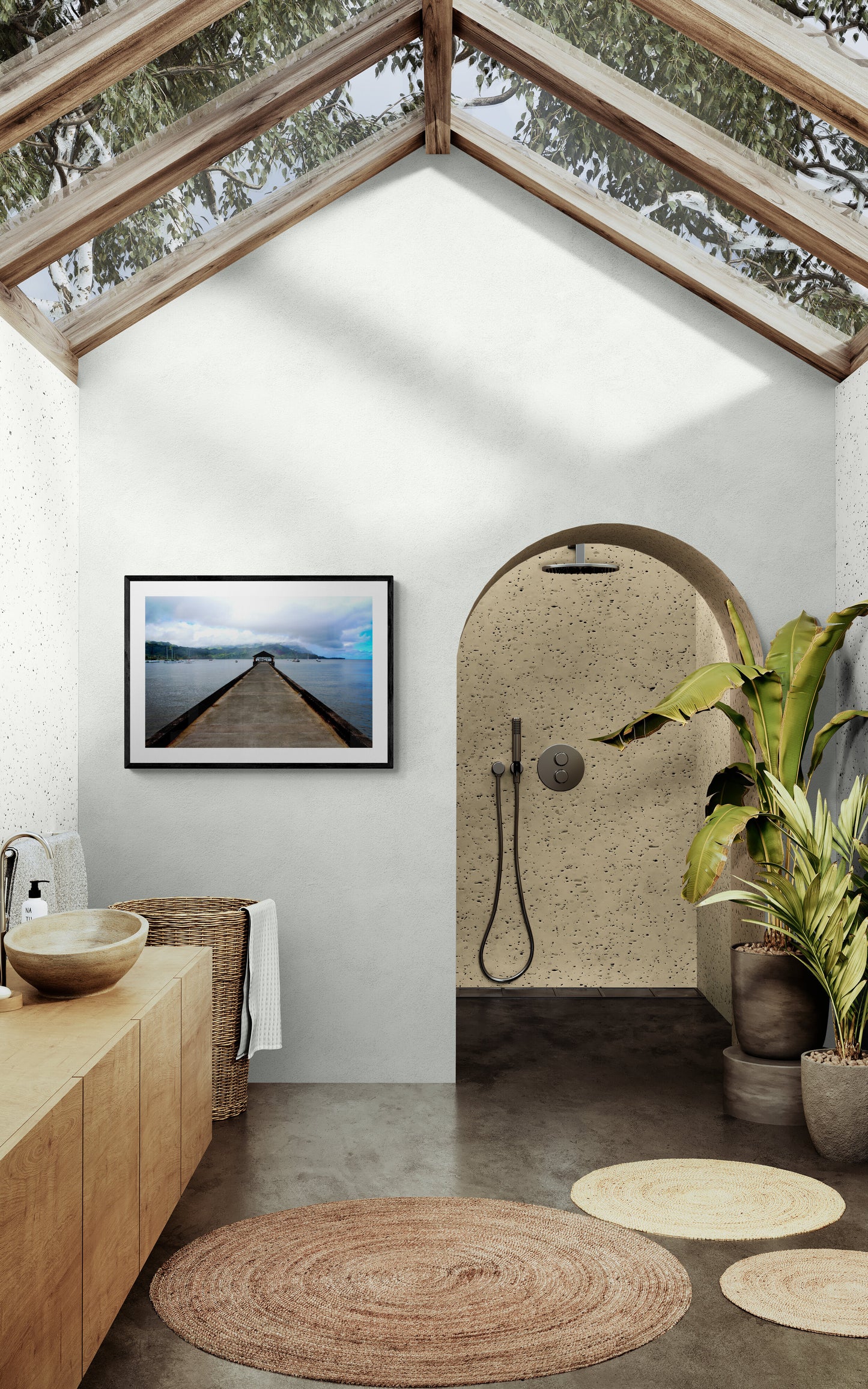 Modern bathroom with shower area, artwork, and plants.