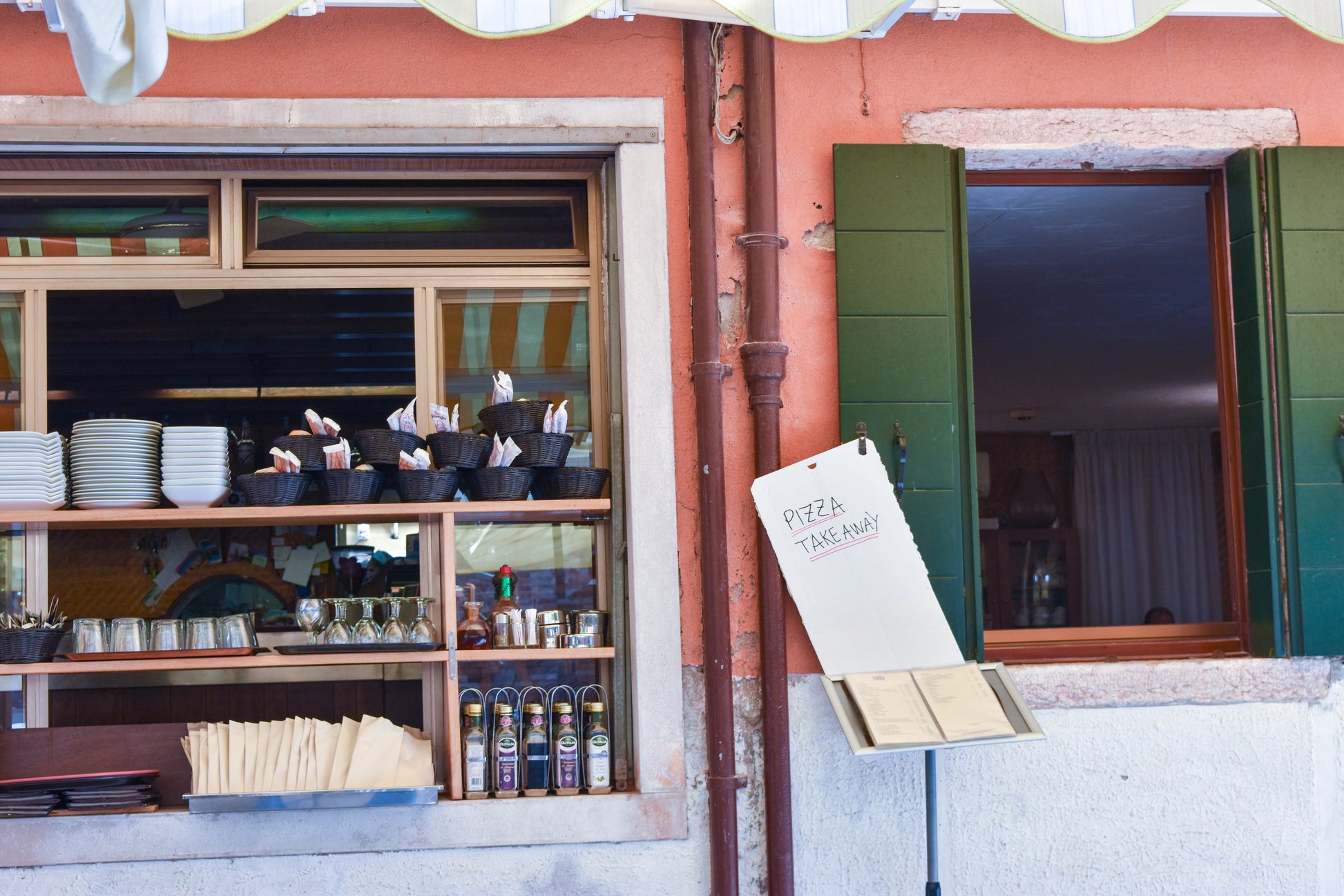 Scene of a Pizza Take Out Window in Rome, Italy
