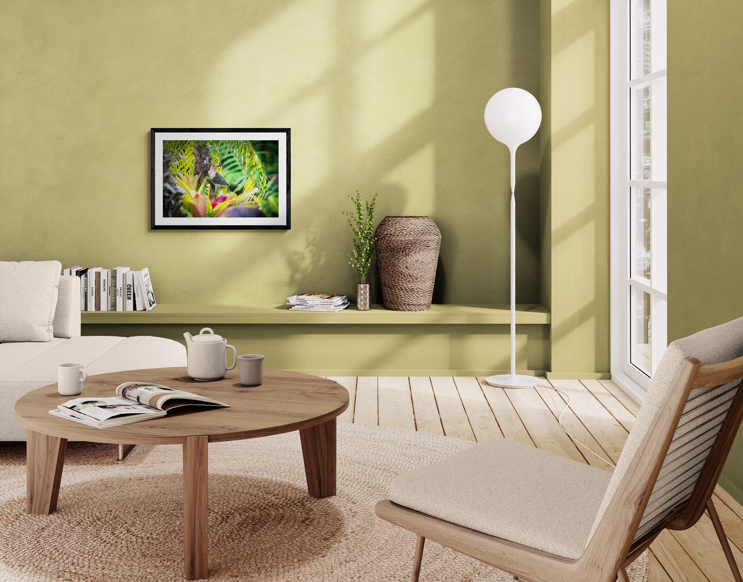 Living room with green walls, wooden furniture, and decorative items.