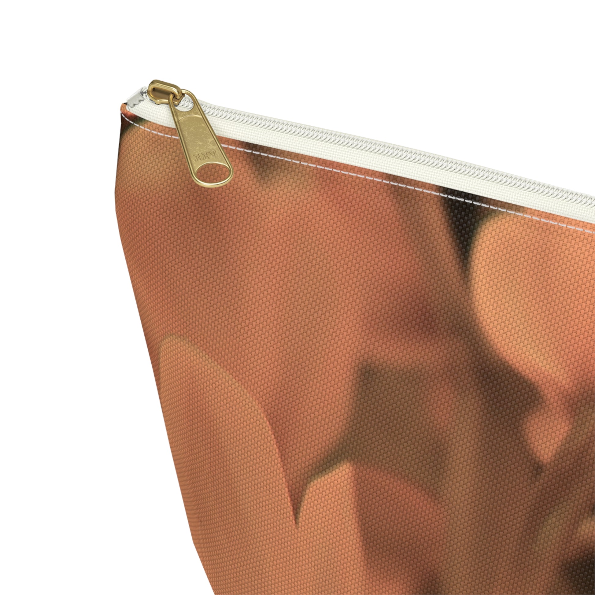 Close-up of a brown pouch with a gold zipper on a white background