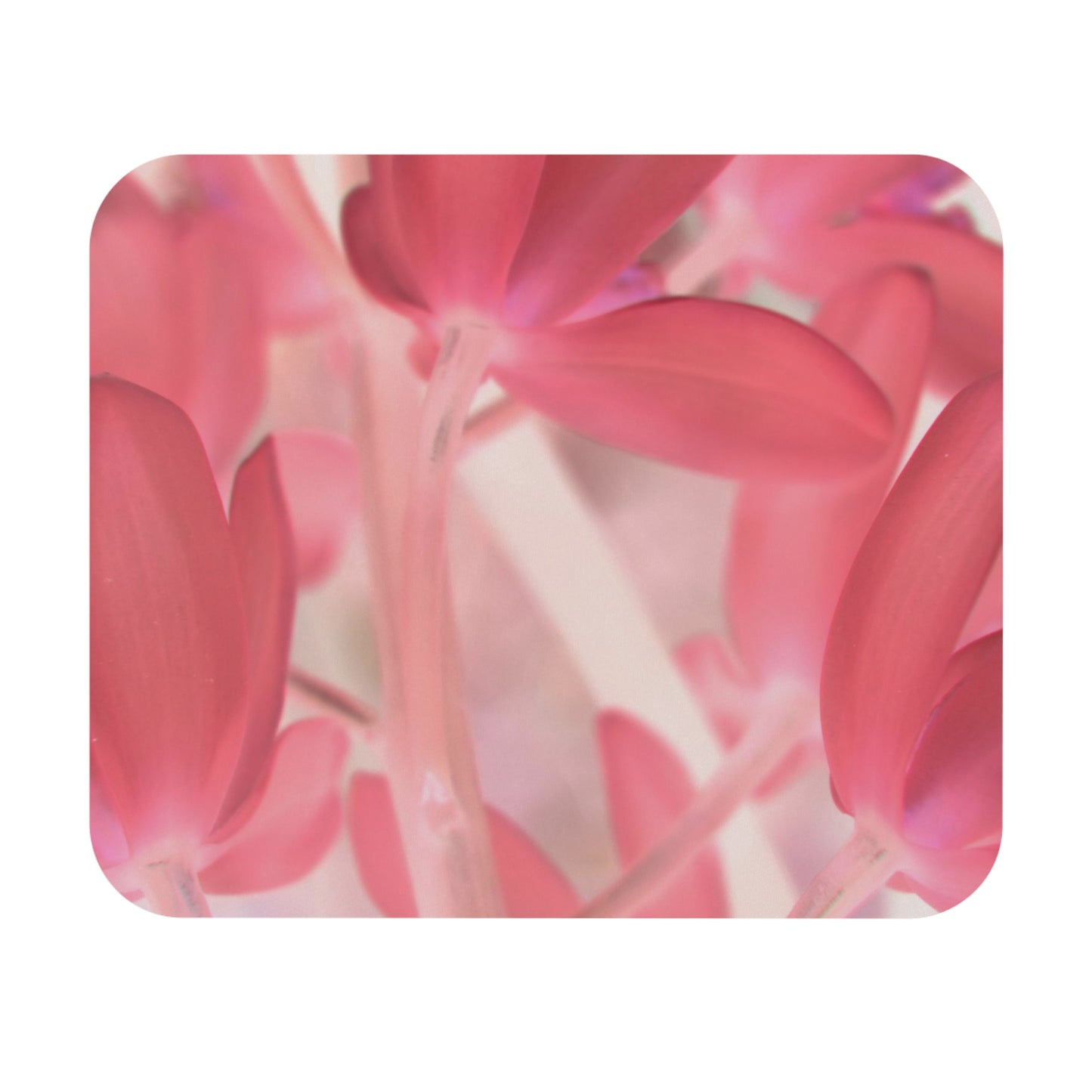 A close-up image of a mouse pad with a pink tinted orchid design.