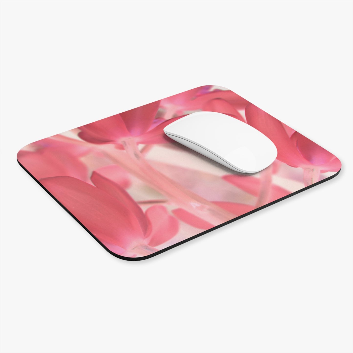 mouse pad with a pink tinted orchid by Kim Bailey
