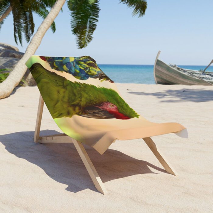 Green Parrot Beach Towel Draped on a Chair